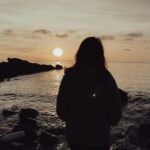 Girl looking on a beach area