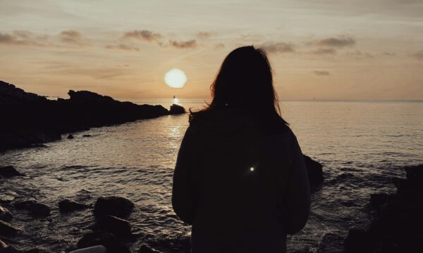 Girl looking on a beach area
