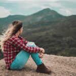 Girl sitting on a High area