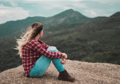 Girl sitting on a High area