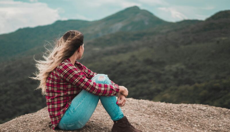 Girl sitting on a High area